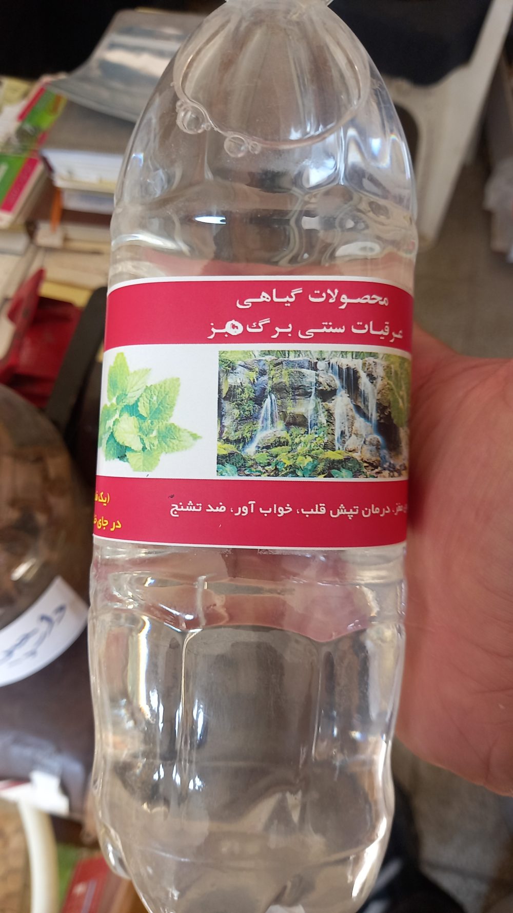 خرید عرق بادرنجبویه بطری یک لیتری